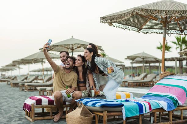 istock Friends Taking a Selfie at the Beach 2161515834