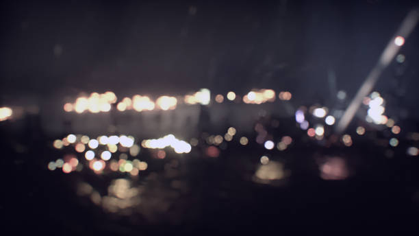 istock Blurry Nighttime View of City Lights 2161521620