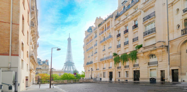 istock eiffel tour and Paris street 2161529200