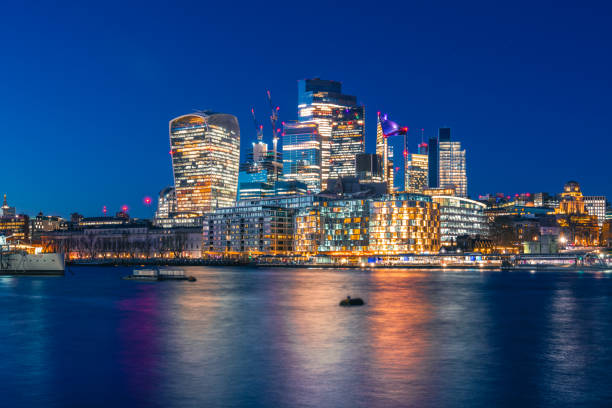 istock Night view of thames river in London 2161539234