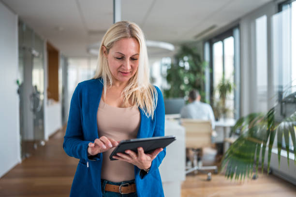 istock Caucasians Businesswoman Using Tablet 2161546841