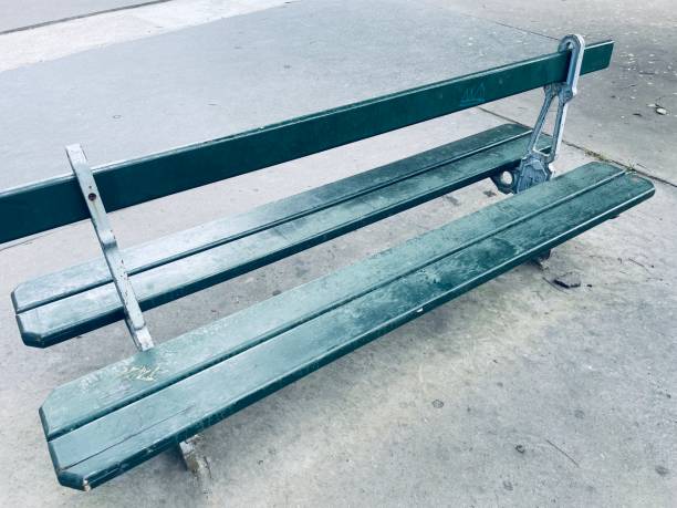 istock A green bench by the road side 2161547039