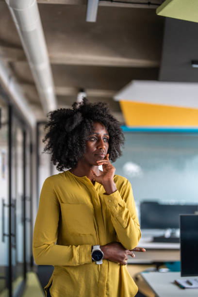 istock Thoughtful Black Female Professional in Office Settings 2161552592