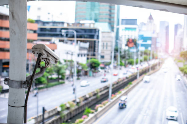 istock Selective focus to CCTV Camera with blurry cable and road. 2161553657