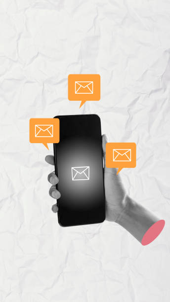 istock Person holding smartphone receiving multiple email notifications on crumpled paper background 2161556913