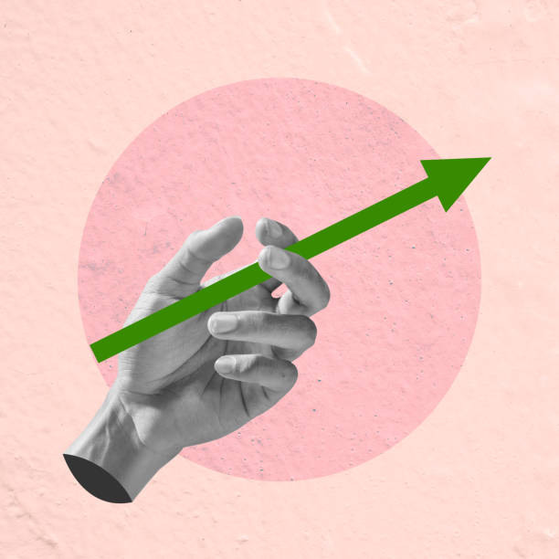 istock The human hand holds an increased arrow 2161557051