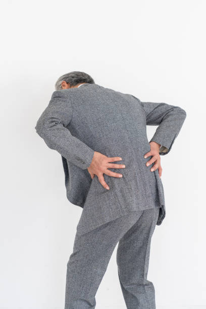 portrait of senior asian businessman,fatigue, back