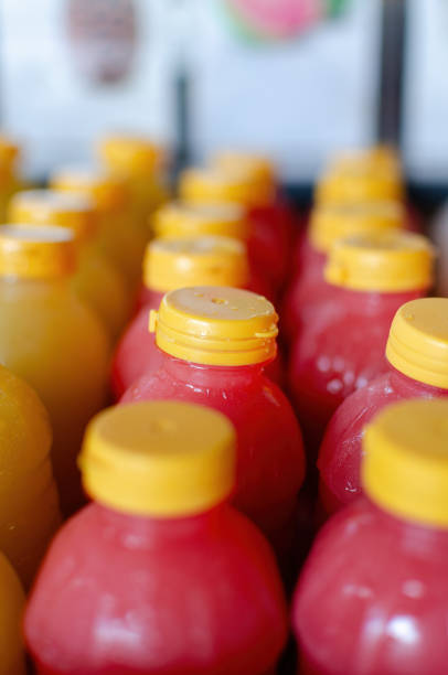 istock bottle jus red yellow 2161559712