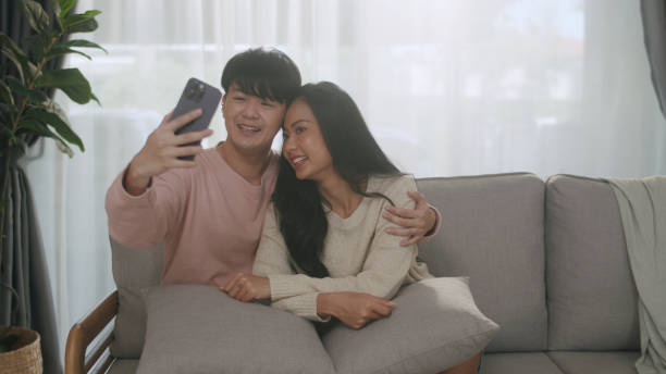 istock Young Couple Capturing a Selfie on a Cozy Day. 2161567627