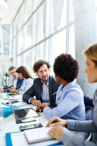 istock Business colleagues talking during a meeting in the office. 2161571176