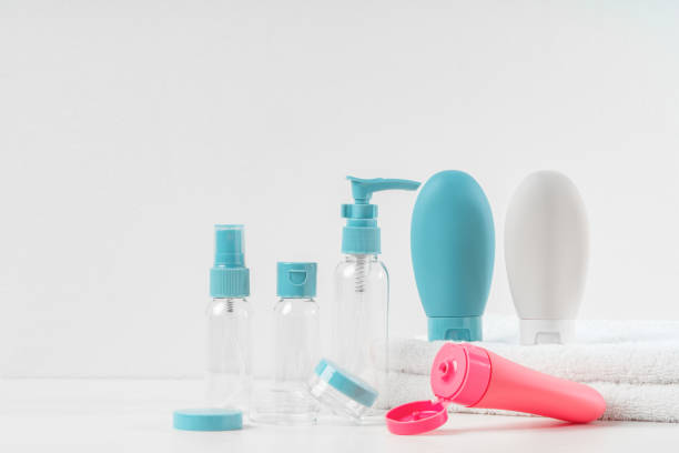 istock Blue, Pink, and White Travel-Sized Bottles on White Towels 2161571349