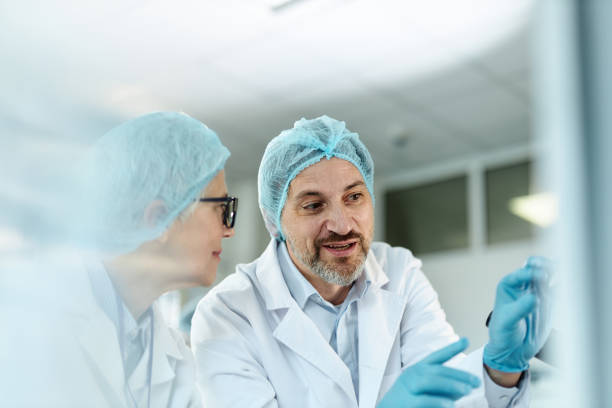 istock Two scientists talking about scientific research in laboratory. 2161571688