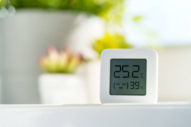istock White Digital Thermometer Displaying Room Temperature and Humidity 2161571715