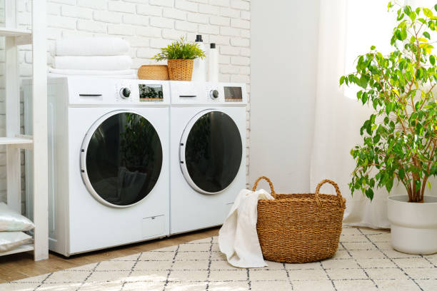istock White Washing Machines in Modern Laundry Room 2161574287