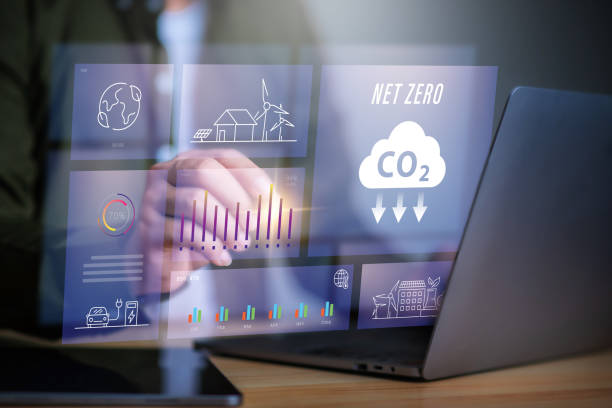 istock Net zero and CO2 carbon emissions neutrality target, Businessman using laptop to analyze net zero project surrounded by net zero icon. 2161579077