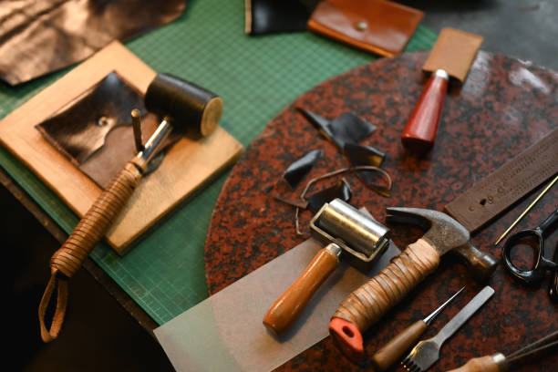istock Leather craft work tools on the workbench. Small business and handmade concept 2161579975