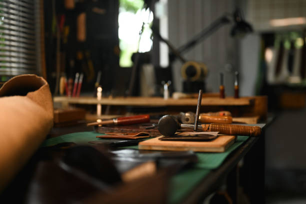 istock Leather craft work tools on the workbench. Small business and handmade concept 2161579993