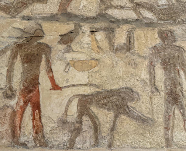 istock Stone tablet with Egyptian symbols and Egyptian pharaoh figures 2161582947