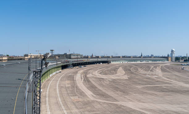 View with airport runway number 14 of Swiss Airport Zürich Kloten with beacons and defocus background on a sunny day. Photo taken March 19th, 2025, Zurich Kloten, Switzerland.