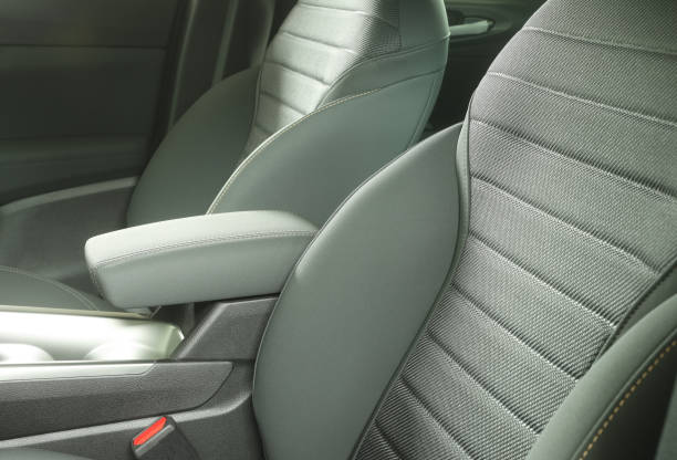 istock Car seats leather bucket type front grey interior with safety belt 2161585107