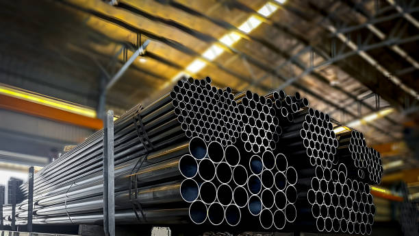 istock high quality steel pipes  in stack waiting for shipment in warehouse. Construction products on transport for industrial materials Construction engineering products.Steel group for industry material 2161590144