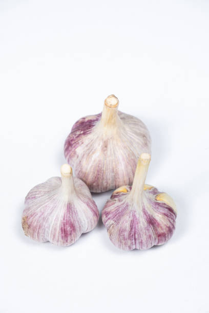 Garlic cloves on the white