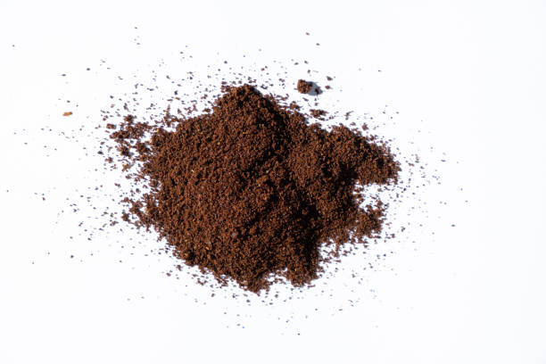 istock Scattered ground natural coffee on white background, top view. 2161592750