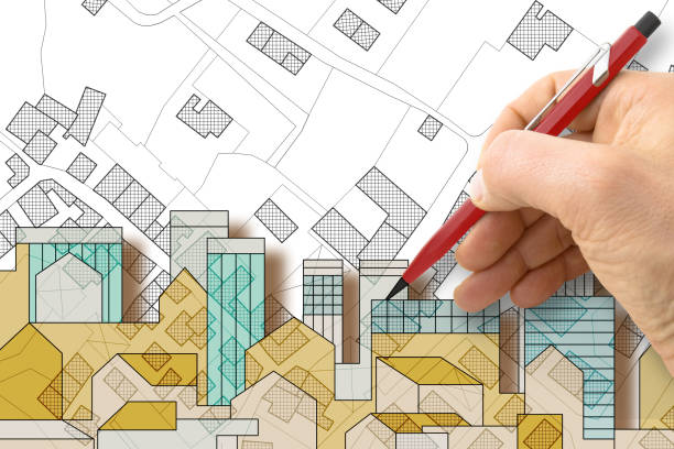 istock BUILDING PERMIT CONCEPT with imaginary cadastral map and General Urban Plan - Building activity and construction industry ideas with cityscape 2161592979