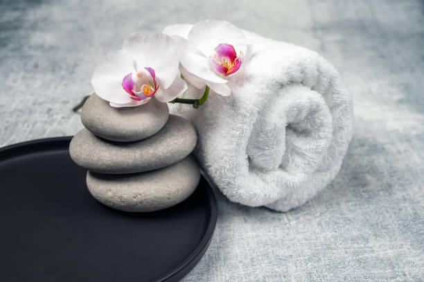 istock Spa decoration with orchid flowers and spa stones 2161594380