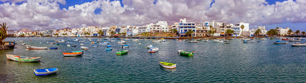 View over the Seafront Promenade at Arrecife  Lanzarote. Spain.  People can be seen on the promenade.