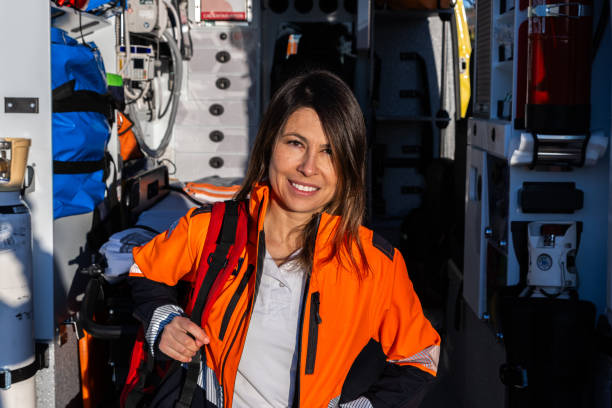 istock Paramedic standing outside the ambulance. 2161597376