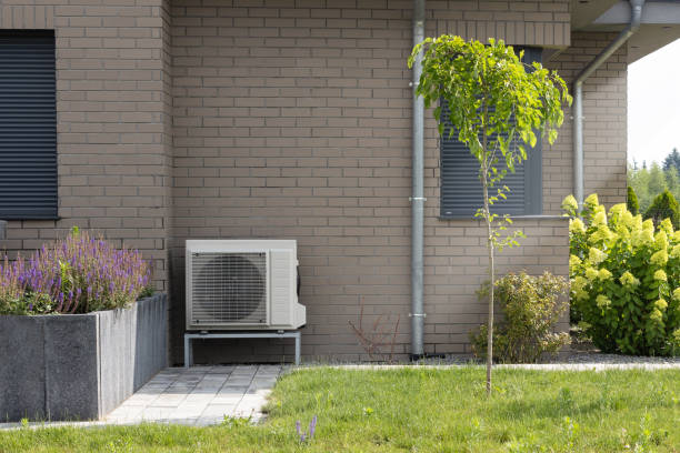 istock Outdoor Heat Pump on Brick Wall Background 2161599668