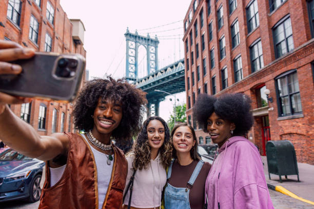 istock Multi-ethnic friends taking a selfie in New York 2161599814