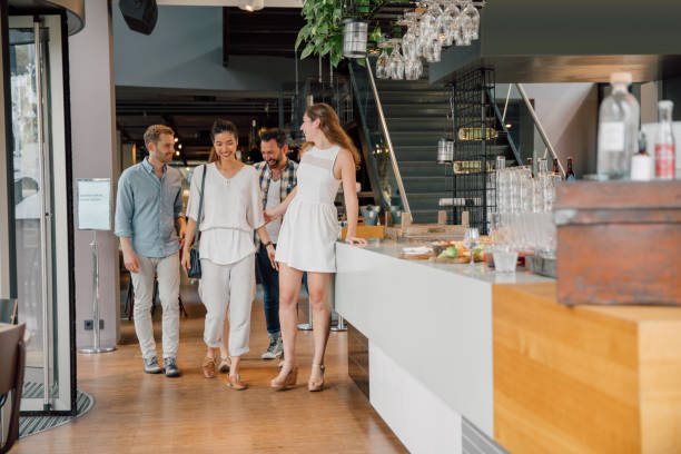 istock Friends in a modern bar & restaurant 2161600681