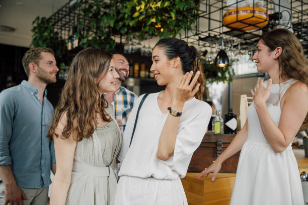 istock Friends in a modern bar & restaurant 2161600729