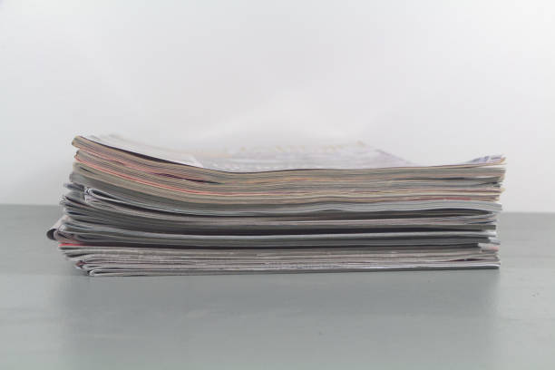 Stack of old newspapers close-up