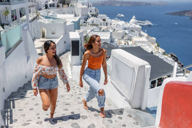 istock Tourists Enjoying Summer in Santorini 2161601880