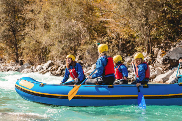 istock Family and Guide Enjoying Whitewater Rafting Adventure 2161603443
