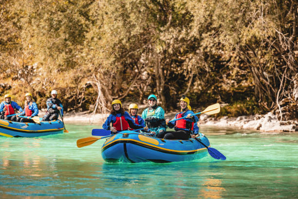 istock Family Enjoying Whitewater Rafting Adventure with Guide 2161603445