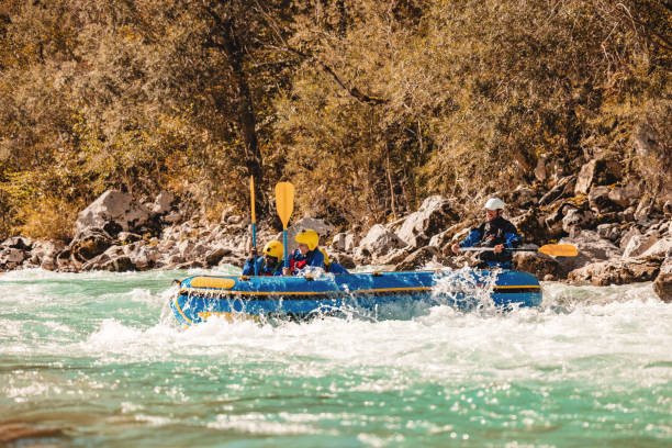 istock Family adventure rafting with guide on river rapids 2161603448