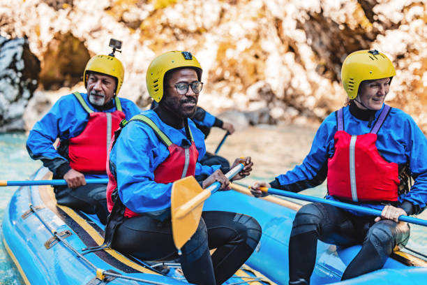 istock Diverse Team Enjoying Whitewater Rafting Adventure 2161603460