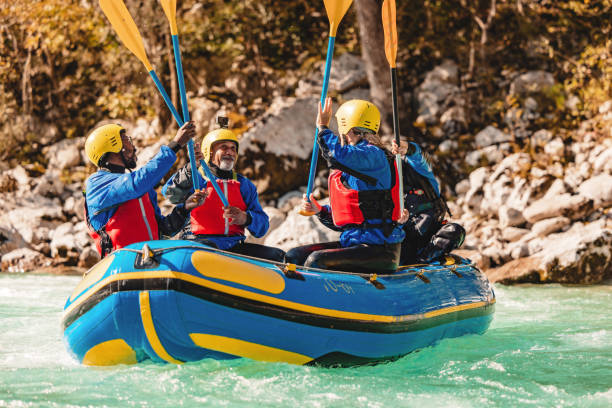 istock Group of Adventurers Whitewater Rafting 2161603479