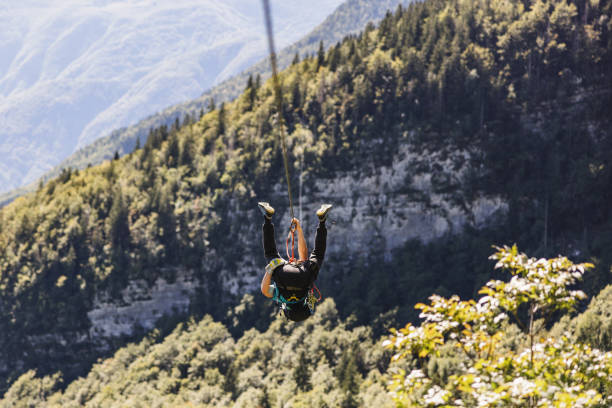 istock Adventurer on a Zipline Over Forest 2161605393