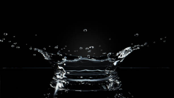 istock Beautiful short Closeup Water Droplet splashing on black background. 3D Render. 2161606537