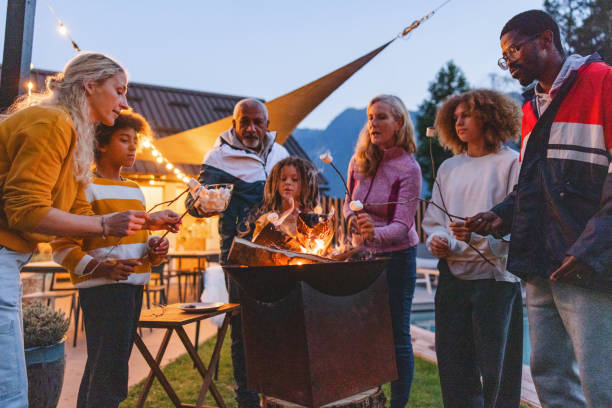 istock Diverse Multigenerational Family Enjoying Camping Activity at Dusk 2161607185
