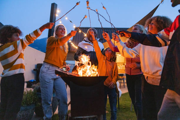 istock Diverse Family Enjoying a Backyard Camping Party at Dusk 2161607228