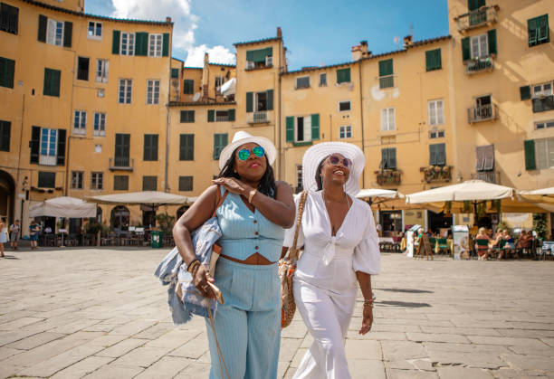 istock Two black female sisters sightseeing in Lucca 2161609993