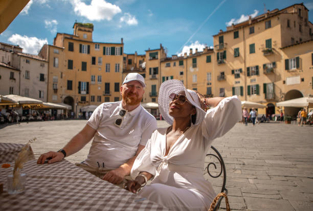 istock Small group of luxury friends sightseeing in Lucca 2161610280