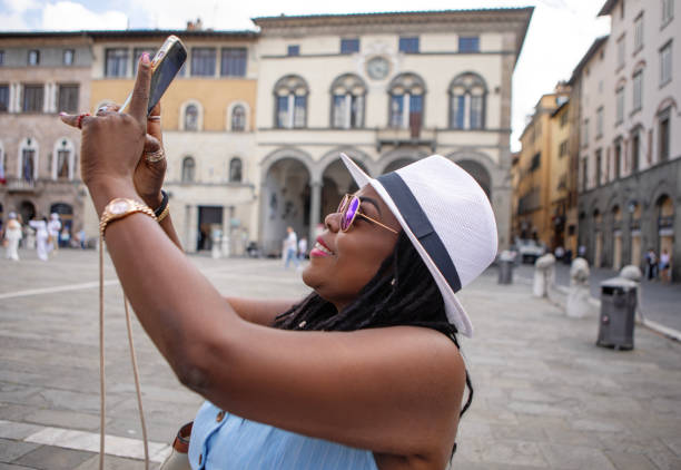 istock Black mature black woman sightseeing in Lucca 2161610312