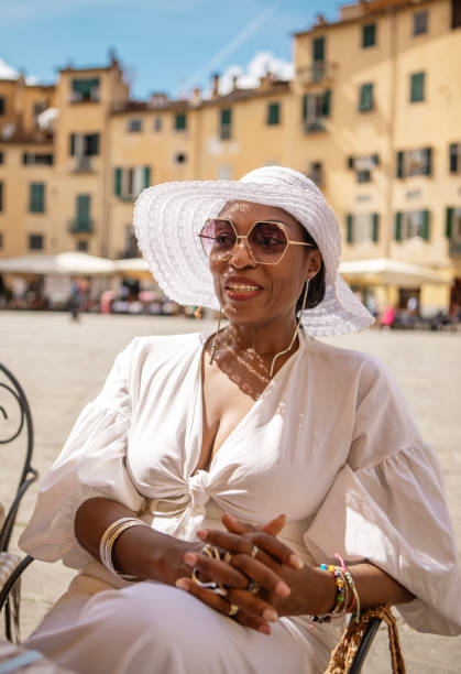 istock Luxury mature black woman sightseeing in Lucca 2161610368